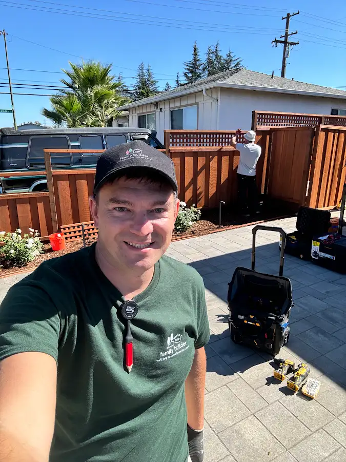 Ivan on site at a wood fence project
