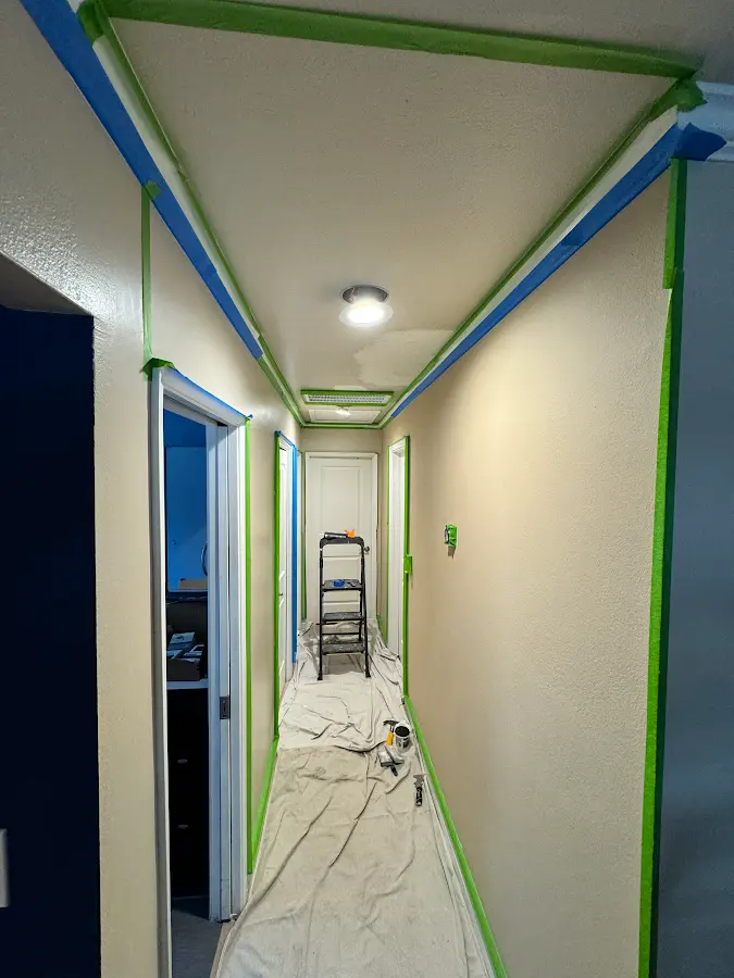 Hallway masked and protected for interior painting
